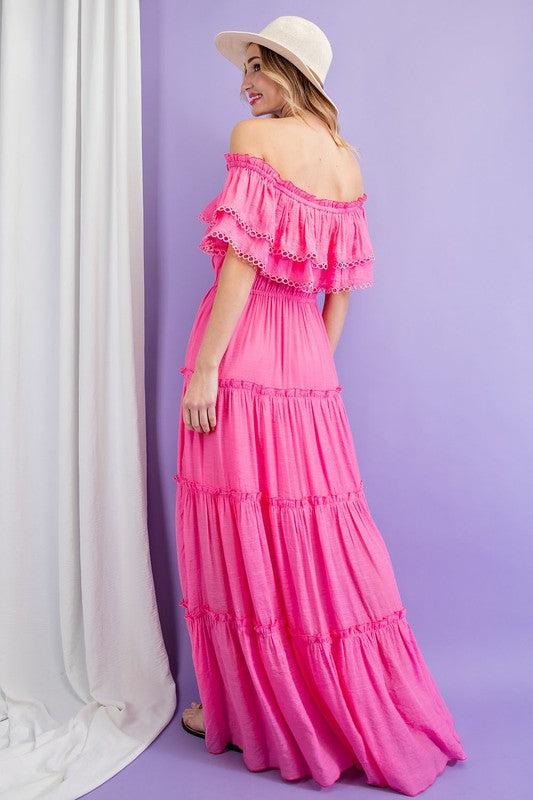 Shop this elegant and swingy maxi dress made in an off the shoShop this elegant and swingy maxi dress in pink made in an off the shoulder look with tiered ruffle accents.ulder look with tiered ruffle accents.