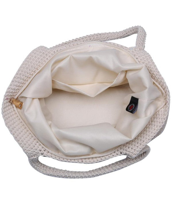 a close up of a hat on top of a purse The Glory Ray Corazon Tote Bag is Made of Woven Yarn and It's Super Functional for those Fun Days Ahead!