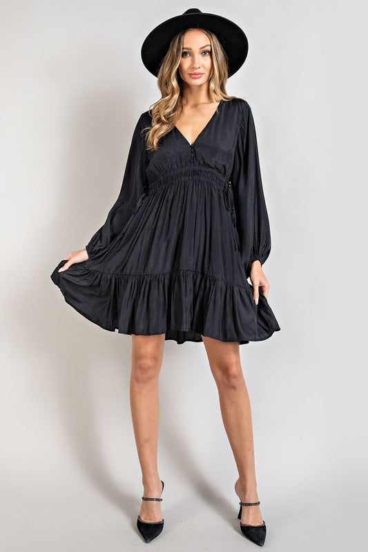 Our Swing Dress in Black is a Must Have for the Spring and Summer Season