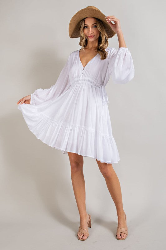 Our Swing Dress in White is a Must Have for the Spring and Summer Season