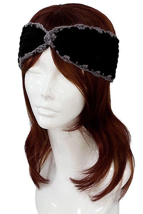 a woman wearing a hat and glasses 