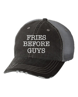 a black hat on top of a black shoe 