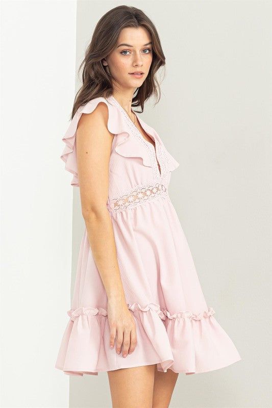 Everly Ruffled Mini Dress is Beautiful and Feminine, Sculpted with a Laced V-Neck and Ruffle Trim at the Bodice for a Playful Touch